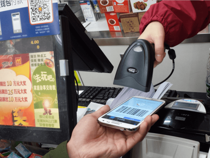 Betalning med Alipay i butikens kassa